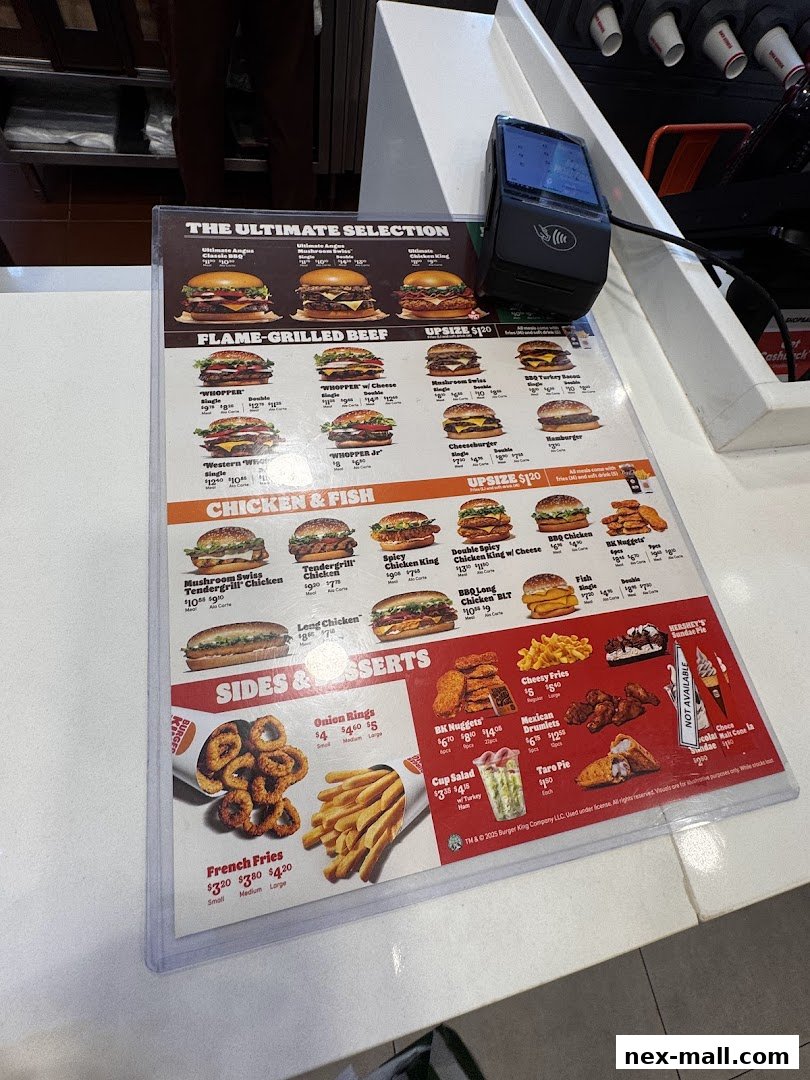 A Burger King menu displaying flame-grilled beef, chicken, fish, sides, and desserts with prices.