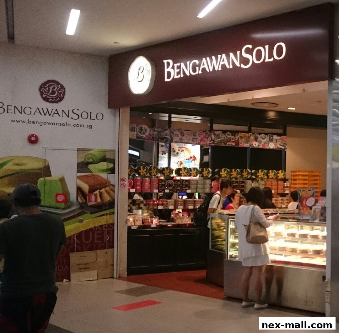 The exterior of a Bengawan Solo shop with cakes and pastries displayed inside.