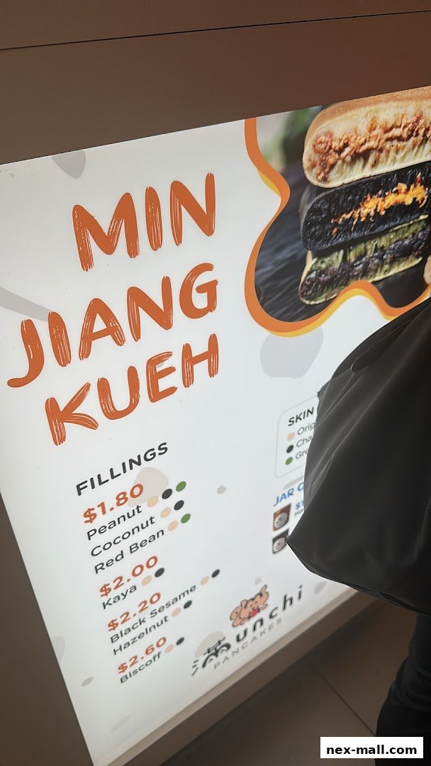 A digital menu displaying various fillings and prices for Min Jiang Kueh.