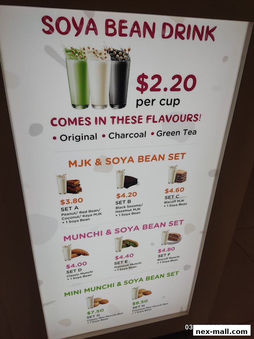 A menu board displaying various soya bean drinks and set meals with prices.