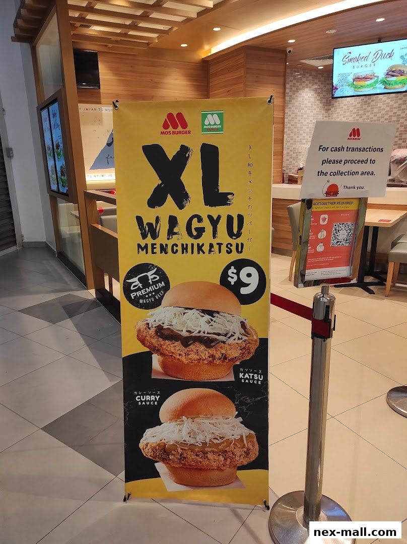 A promotional banner for MOS Burger's XL Wagyu Menchikatsu burger, priced at $9.