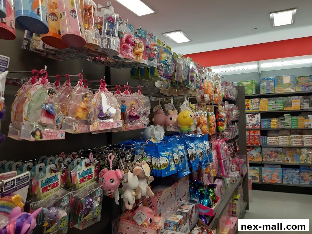 Shelves stocked with various toys, including dolls, plush toys, and board games.