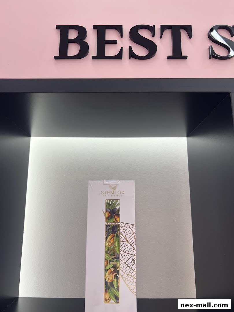 A product display featuring a box with botanical imagery and the text 'STEMTOX SKIN SYSTEMS'.