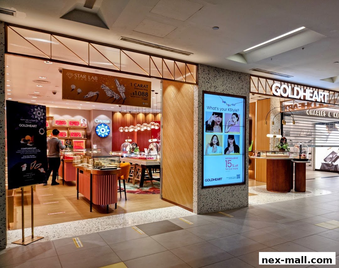 The entrance of a Goldheart Jewelry store showcasing diamond rings and K-style fashion.