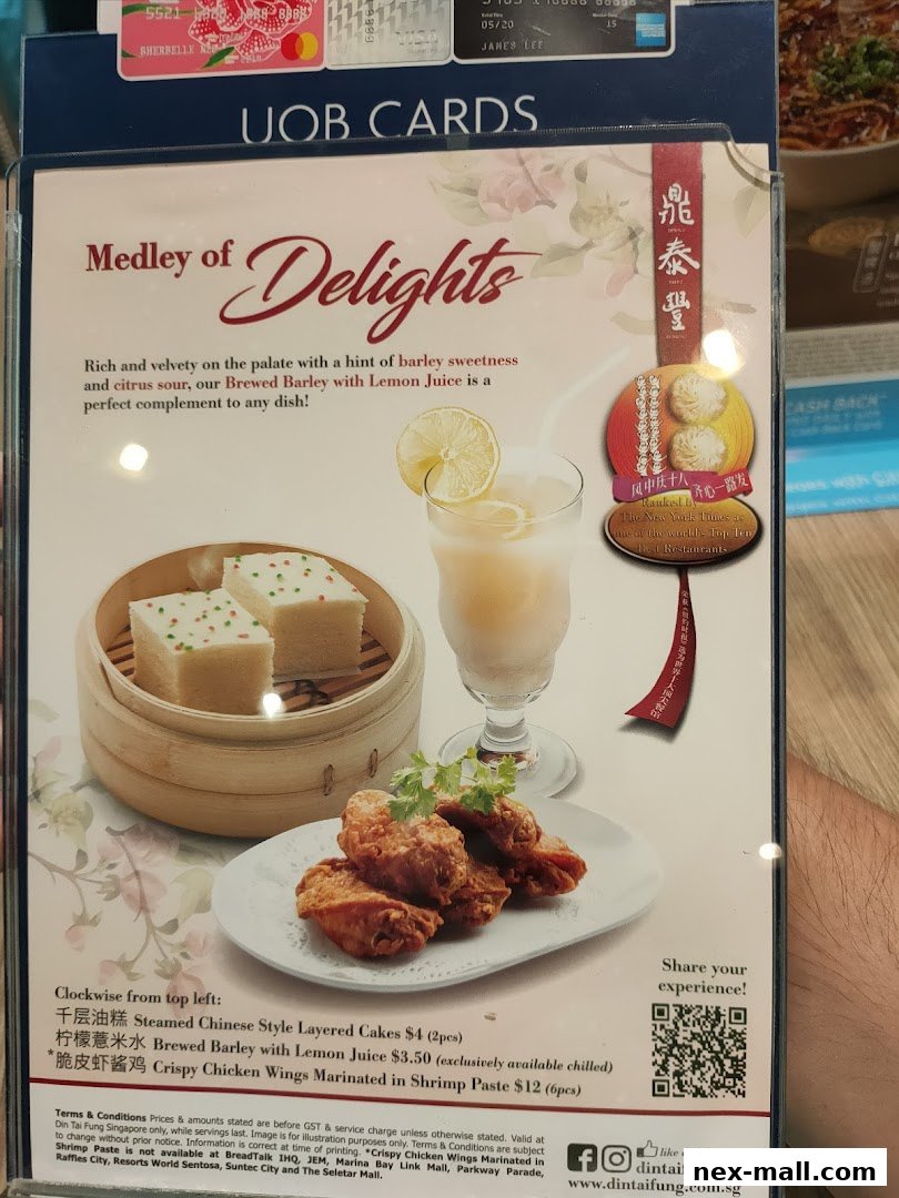A menu featuring steamed cakes, brewed barley with lemon juice, and crispy chicken wings.