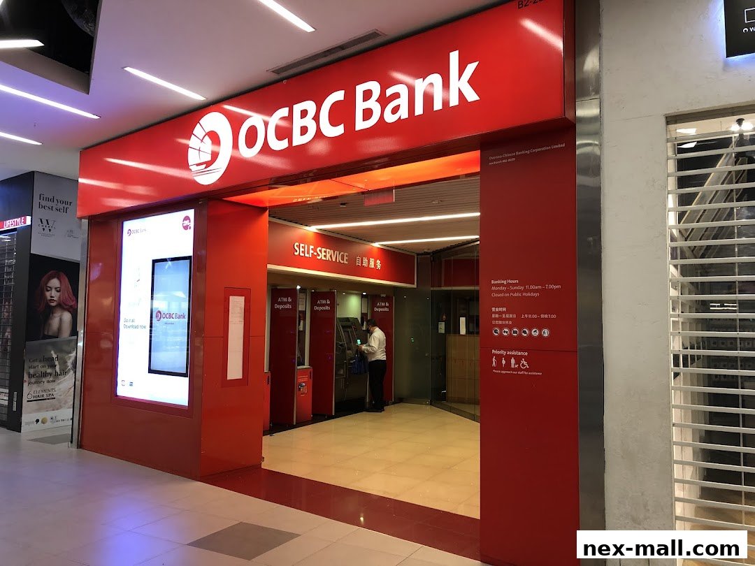 The exterior of an OCBC Bank branch with self-service options and ATMs.