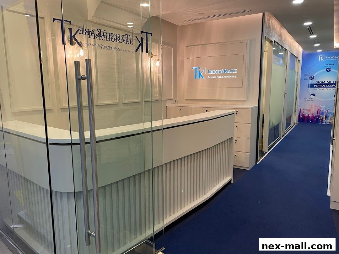 The clean and modern reception area of TK TrichoKare, a hair loss and scalp treatment center.