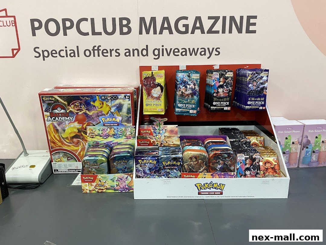 Display of Pokemon and One Piece trading card games and related merchandise.