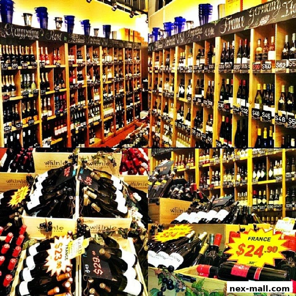A wide selection of wine bottles displayed on shelves and in crates inside a store.