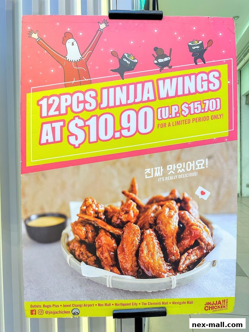 A promotional poster for JINJJA Chicken featuring 12 pieces of wings for $10.90.