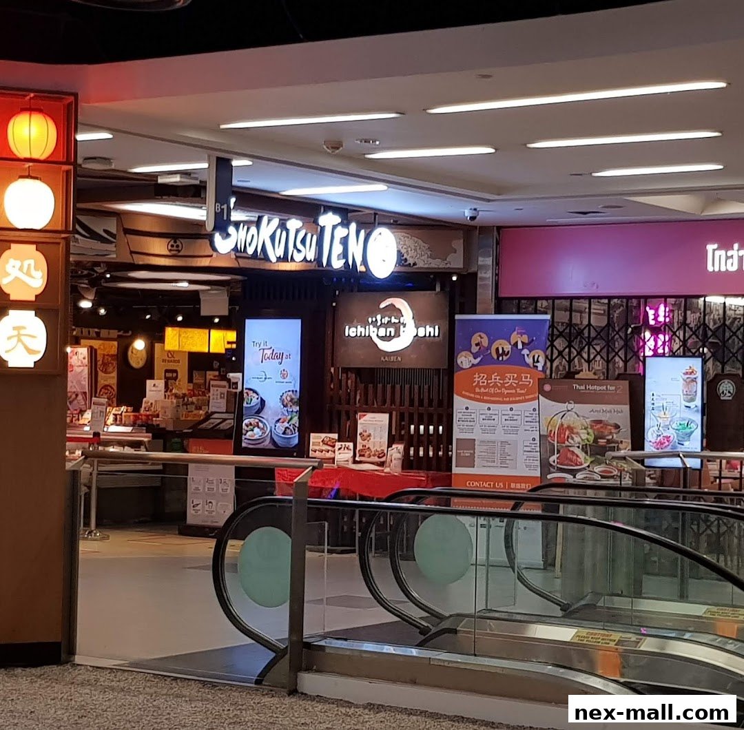 The entrance to Ichiban Boshi NEX, a Japanese restaurant, with signage and promotional displays.