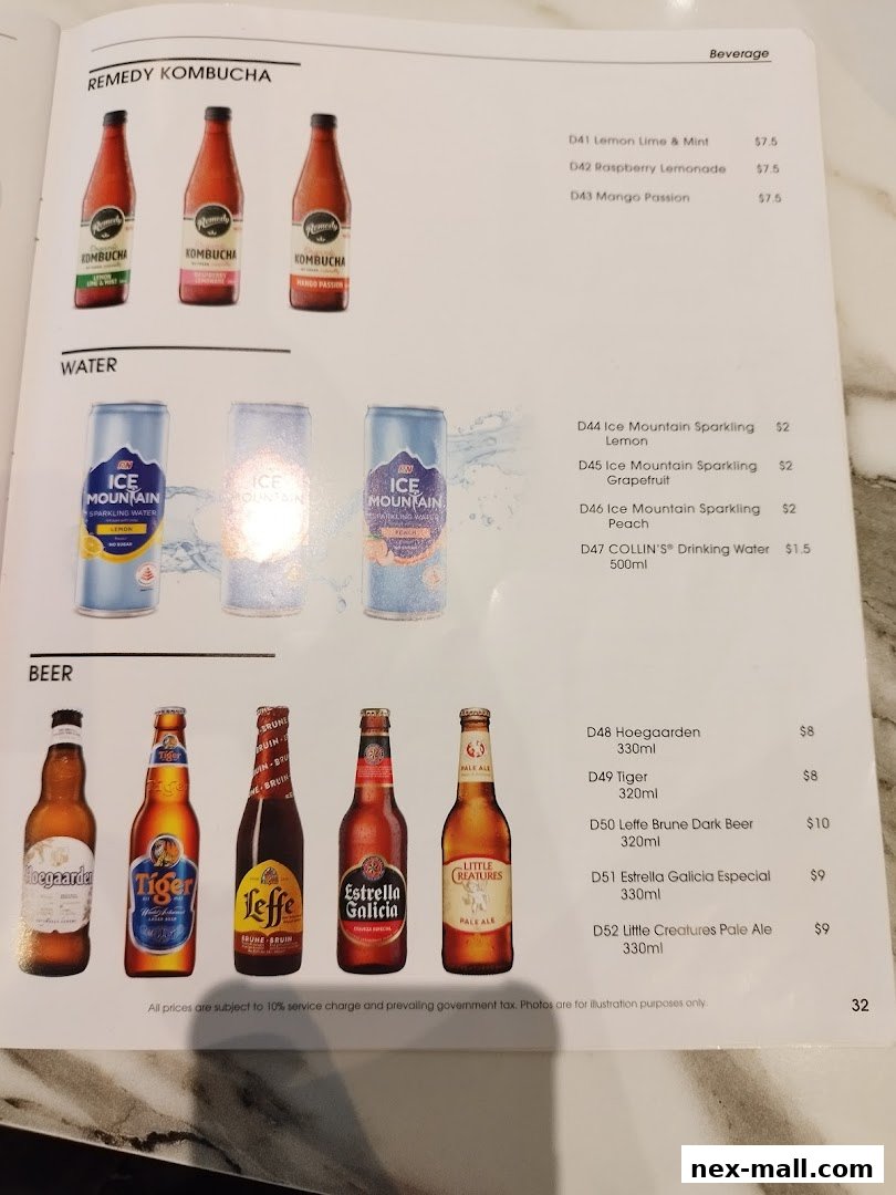 A menu page displaying beverages including kombucha, water, and beer with prices.