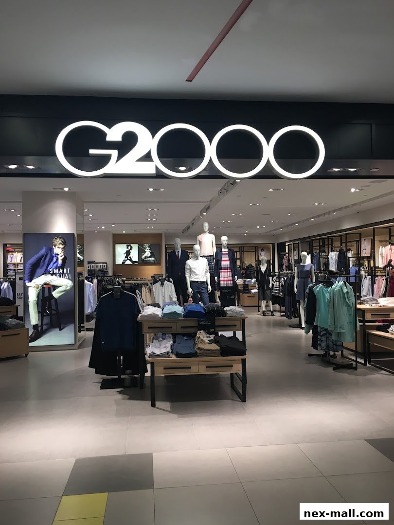 Interior view of a G2000 clothing store with mannequins and apparel displays.