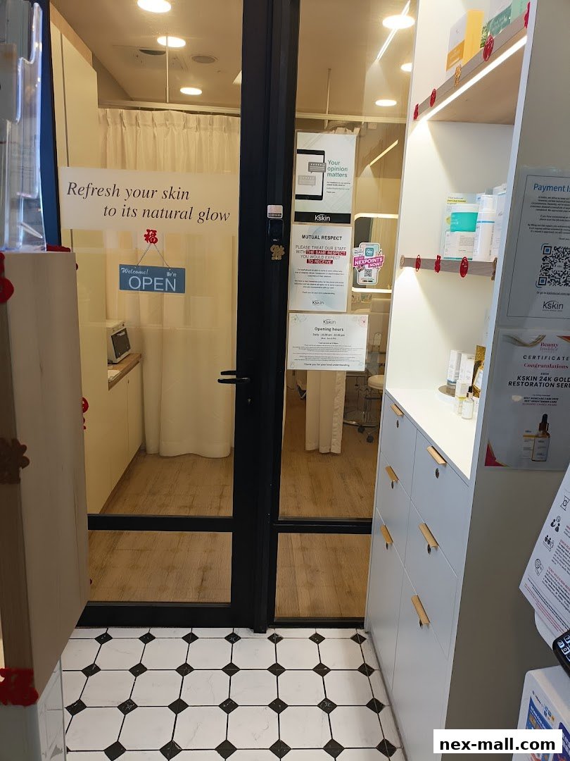 The entrance to Kskin Korean Express Facial, a skincare clinic, with a 'Welcome! OPEN' sign.