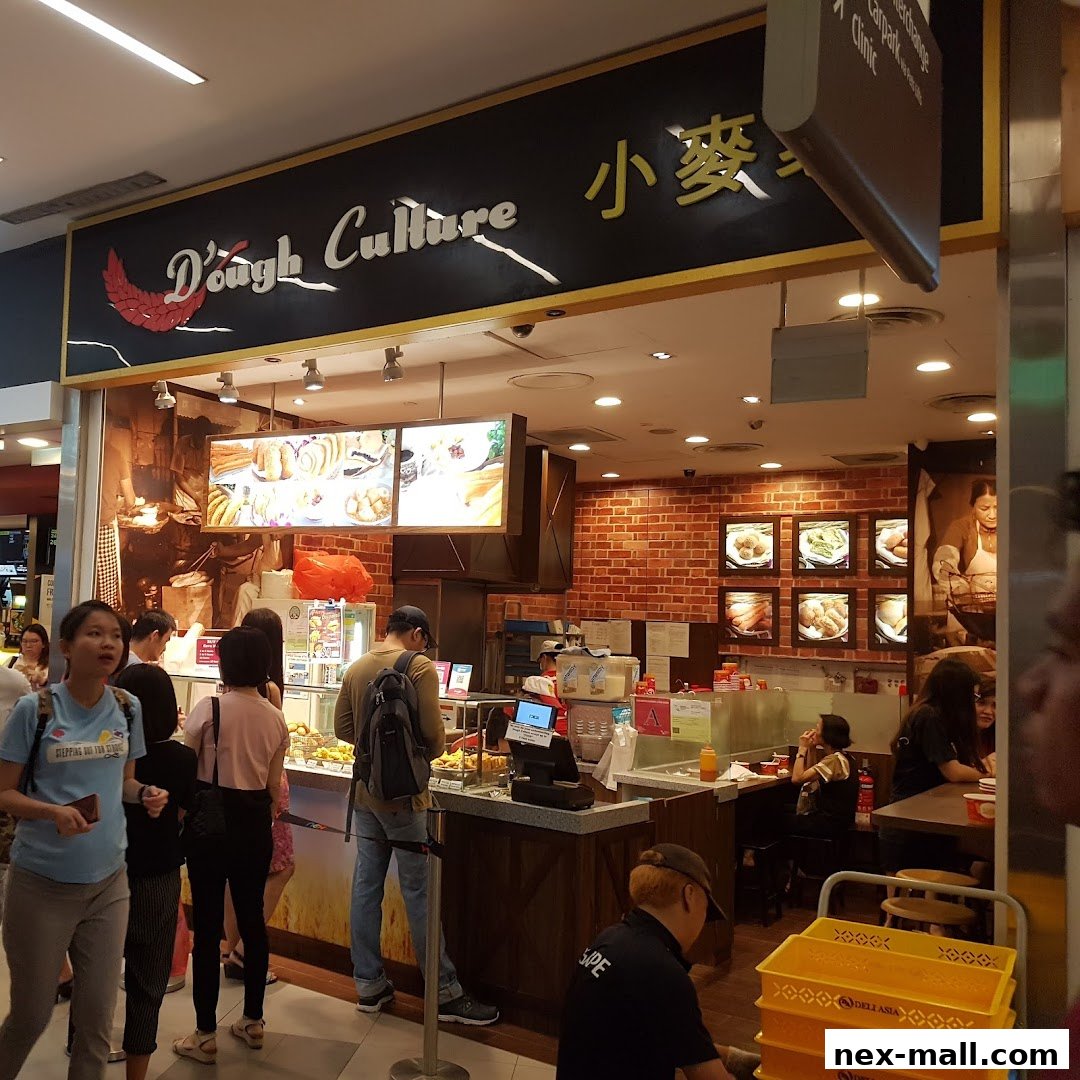 Dough Culture bakery shop with customers ordering and enjoying food.