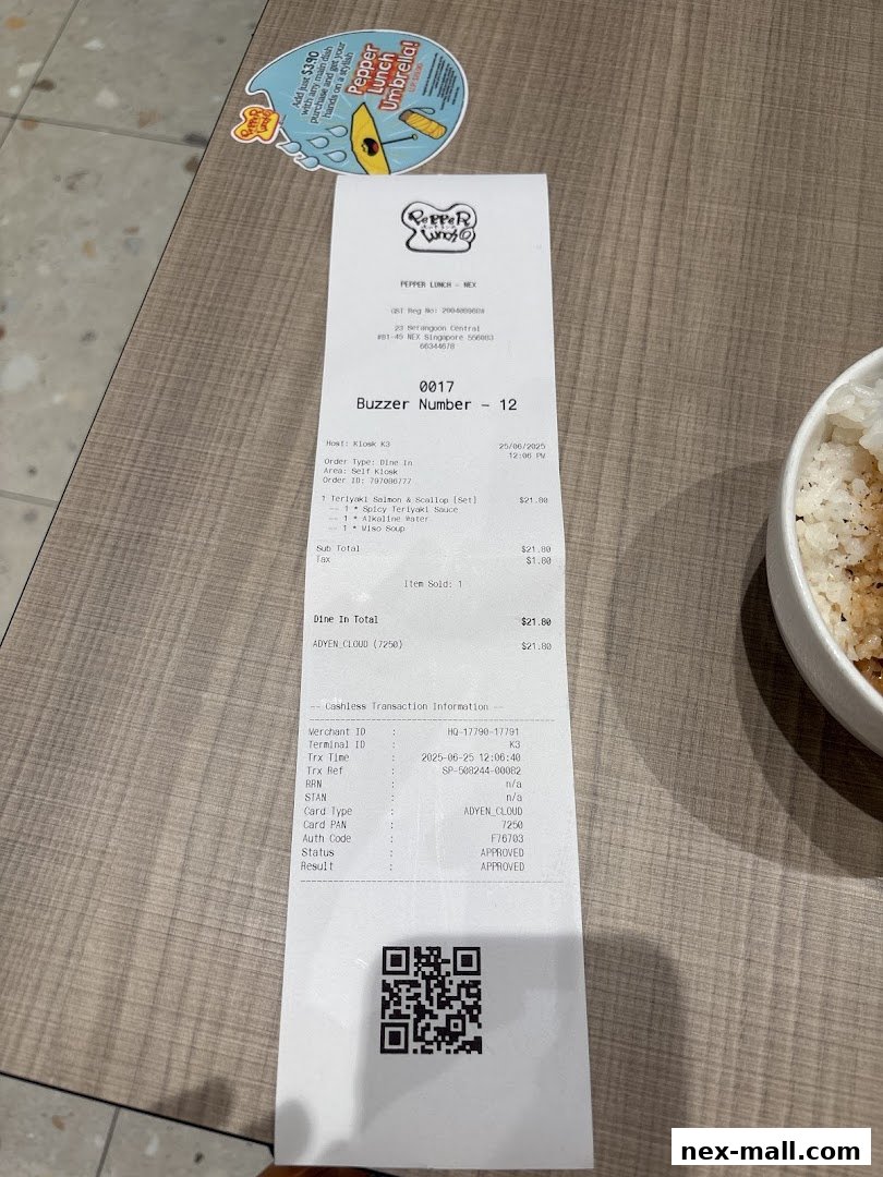 A receipt from Pepper Lunch Express showing a meal order and payment details.