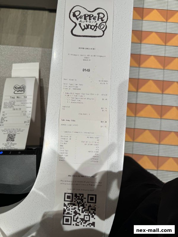 A receipt from Pepper Lunch Express showing food items and transaction details.