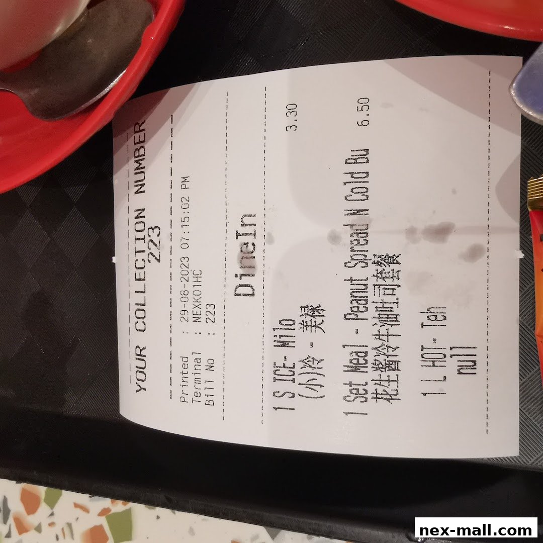 A receipt from The Hainan Story Coffee House Nex showing food and drink orders.