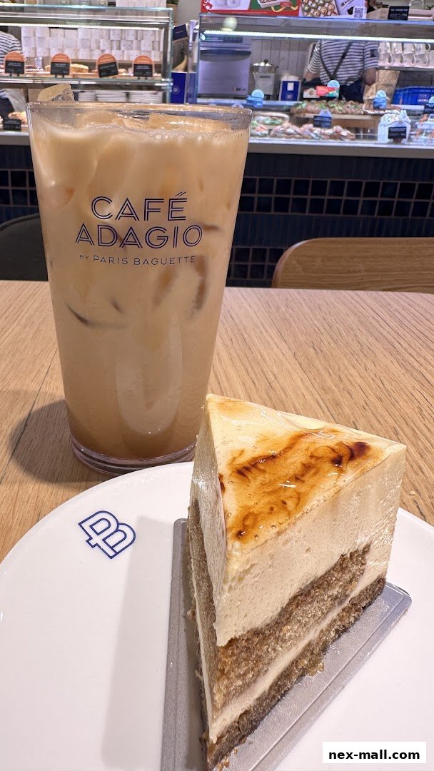 A slice of cheesecake and an iced coffee from Cafe Adagio by Paris Baguette.