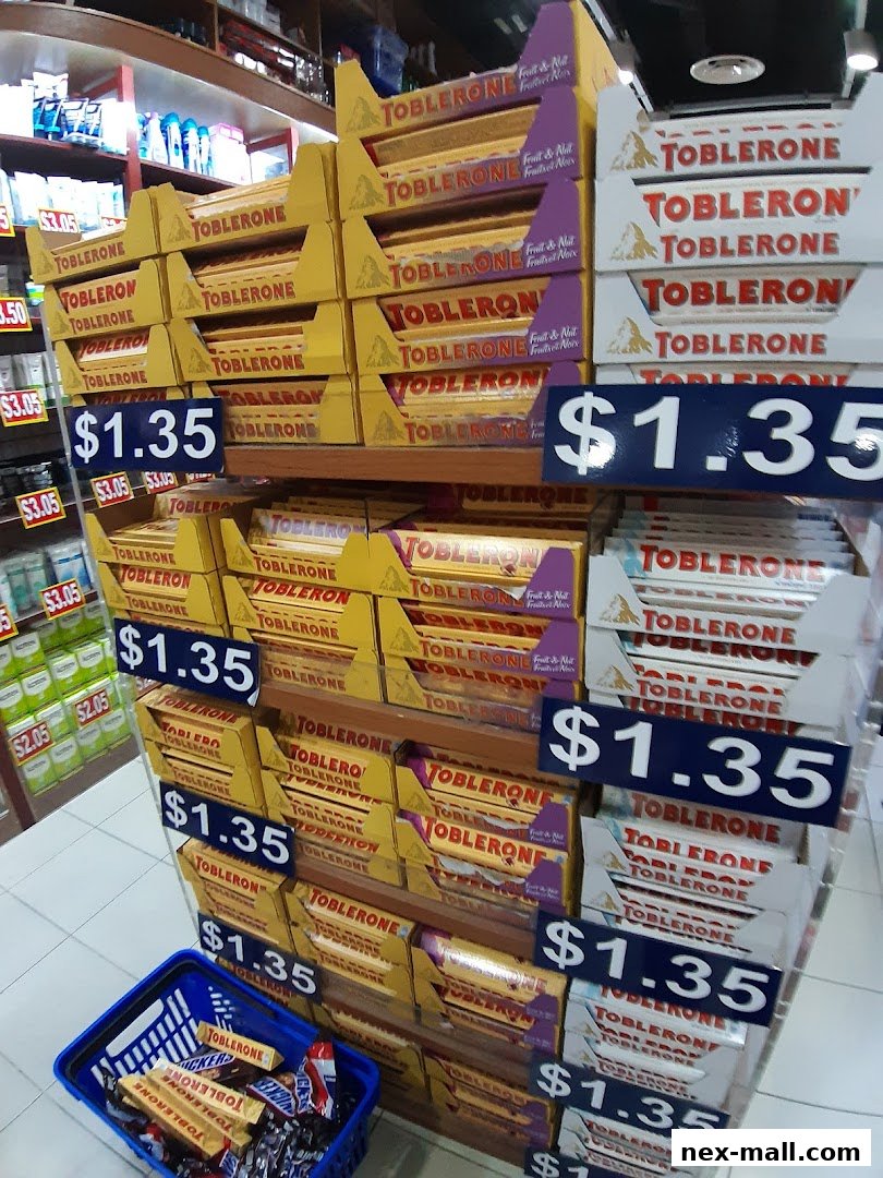 A display of Toblerone chocolate bars with prices prominently shown.