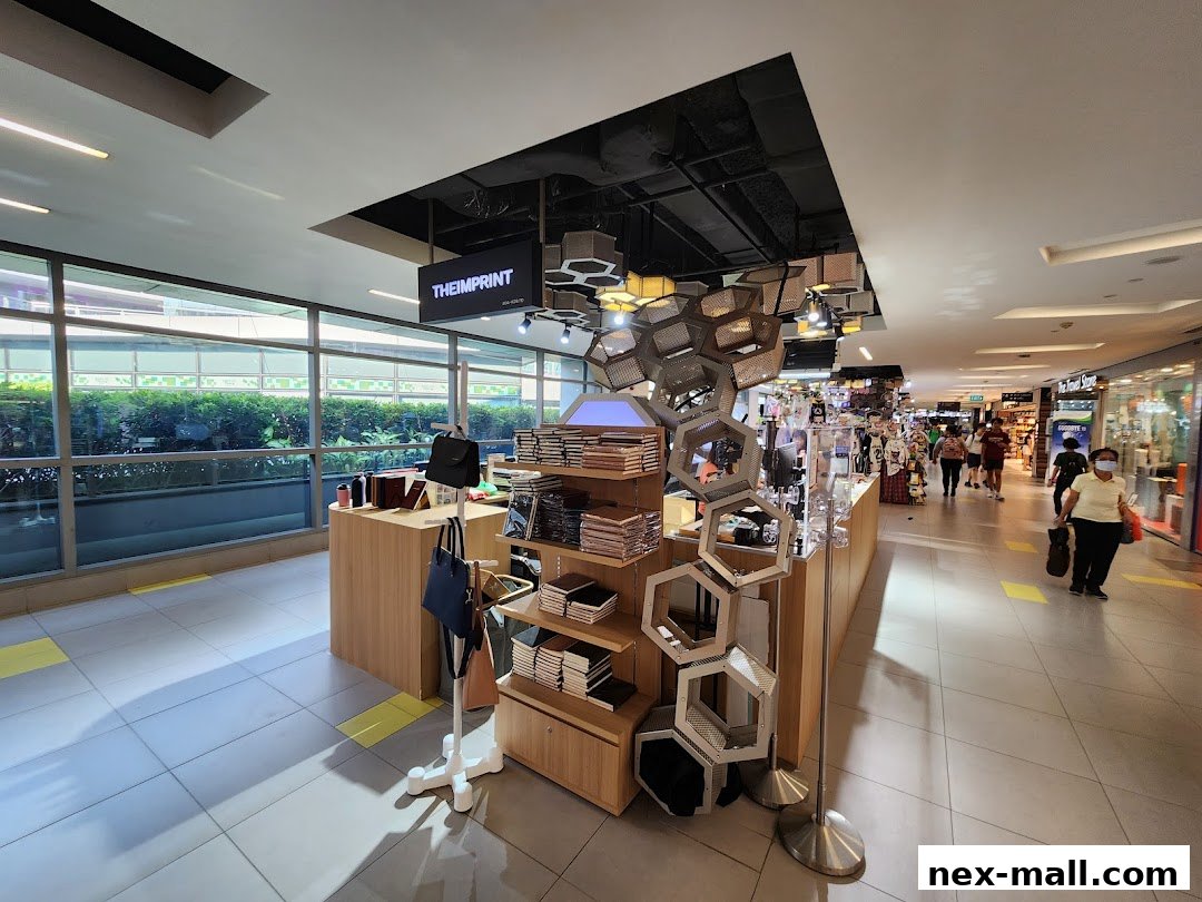 A personalized gift shop with shelves of products and bags displayed.