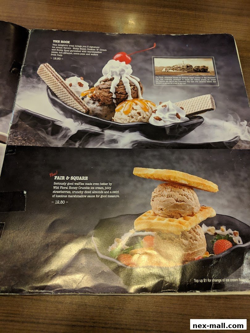 A menu page showcasing two decadent ice cream desserts with detailed descriptions and prices.