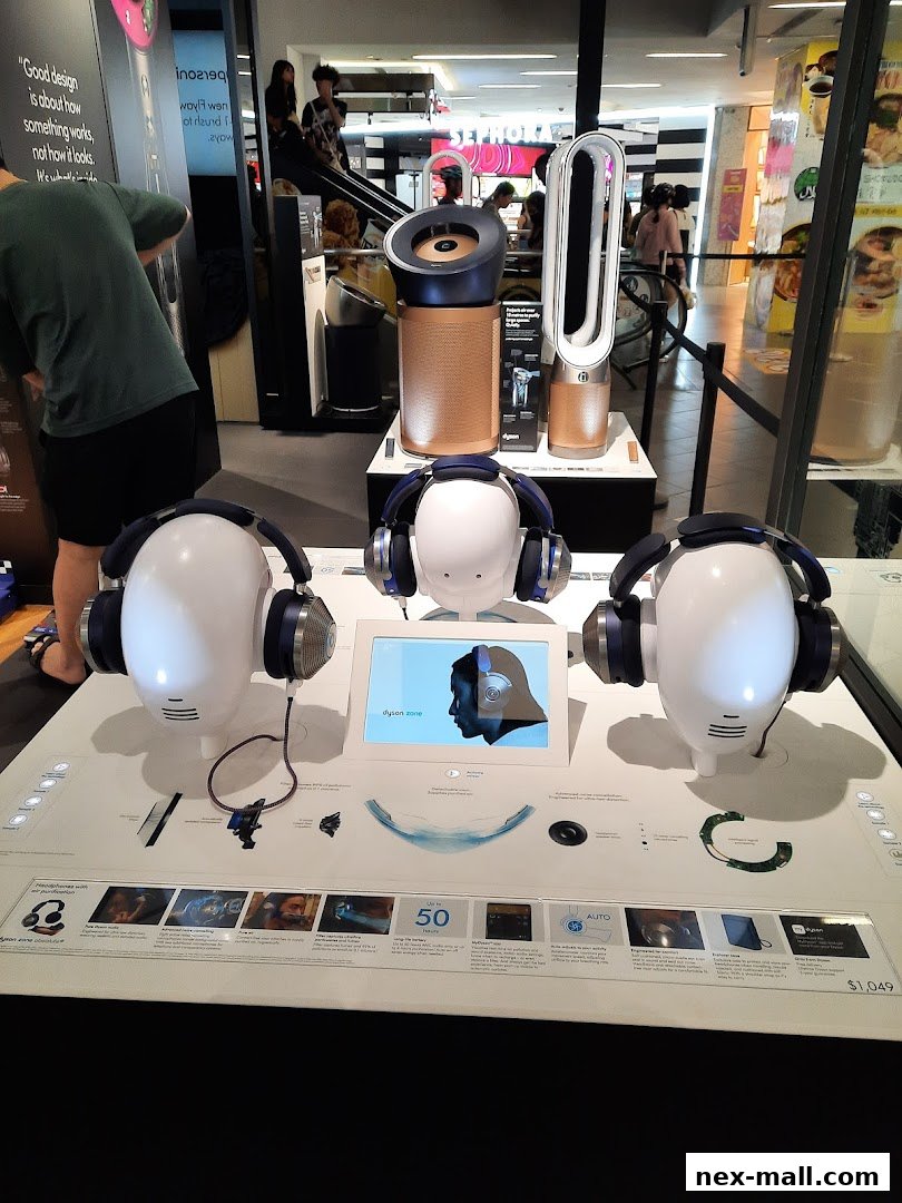Dyson Zone headphones and air purifiers displayed in a retail store.