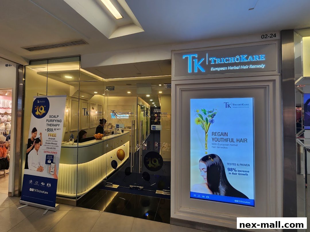The entrance of TK TrichoKare, a European herbal hair remedy shop, with promotional displays.