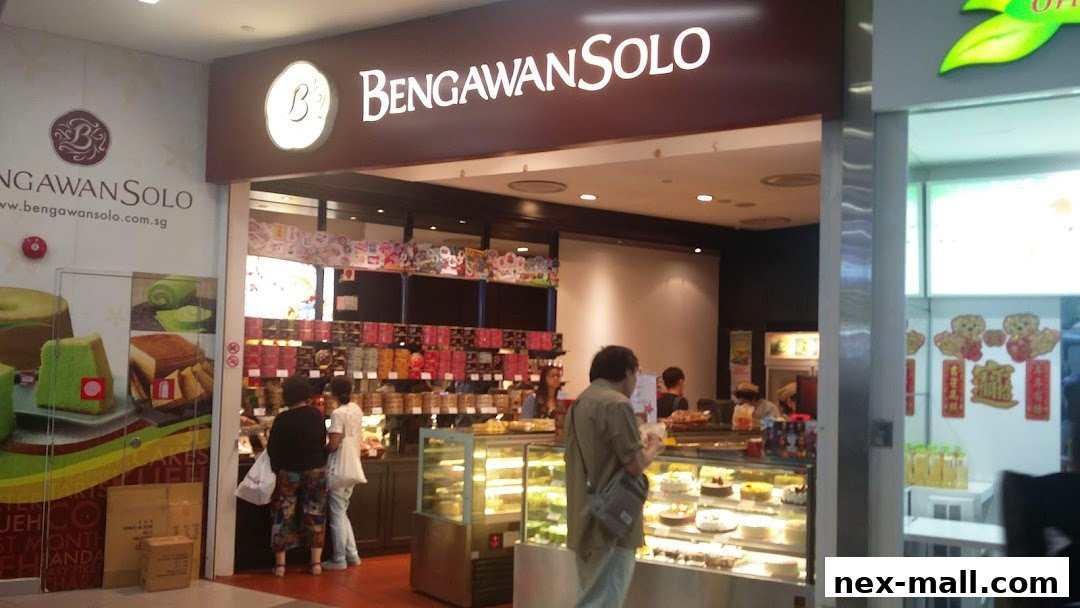 Bengawan Solo shop front with cakes and pastries displayed in display cases and on shelves.