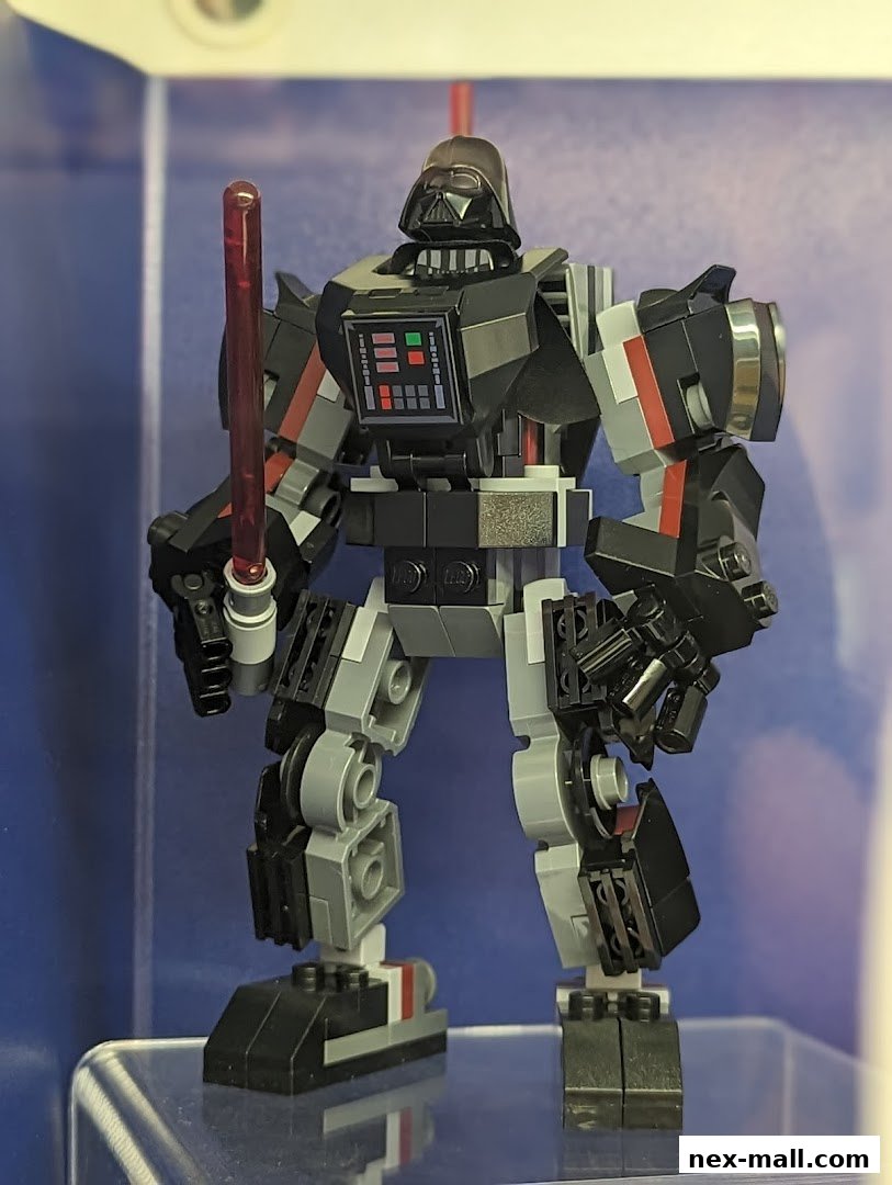 A LEGO build of Darth Vader in a mech suit holding a red lightsaber.
