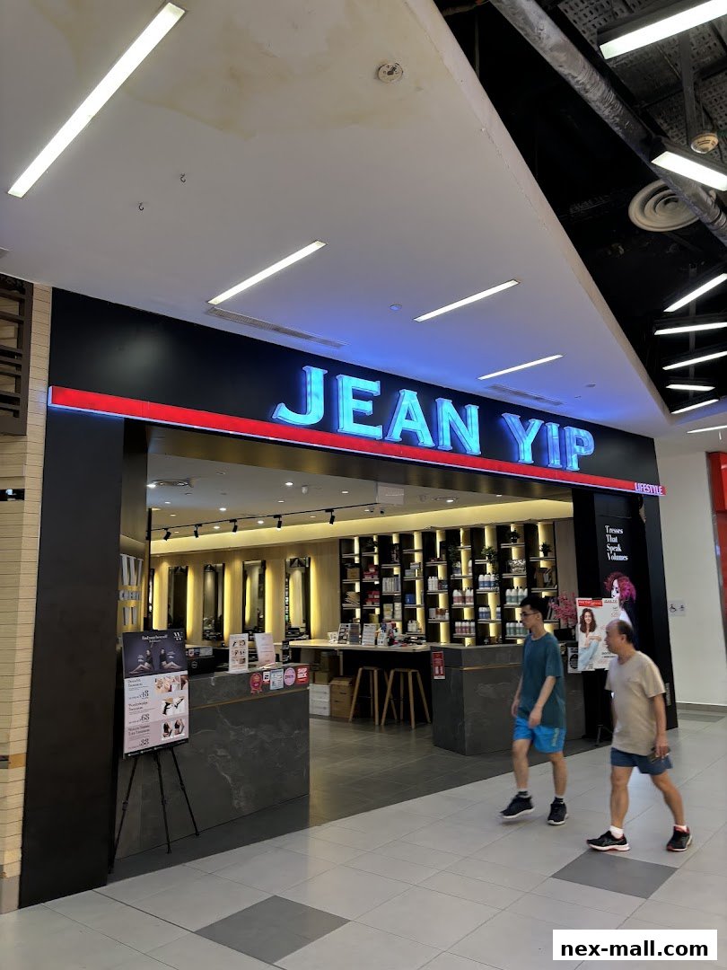 The entrance of Jean Yip Hairdressing salon with its prominent signage and interior visible.