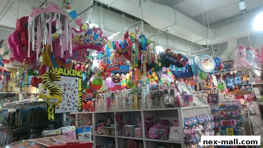 A wide variety of party supplies, including piñatas, balloons, and themed decorations, are displayed in a store.