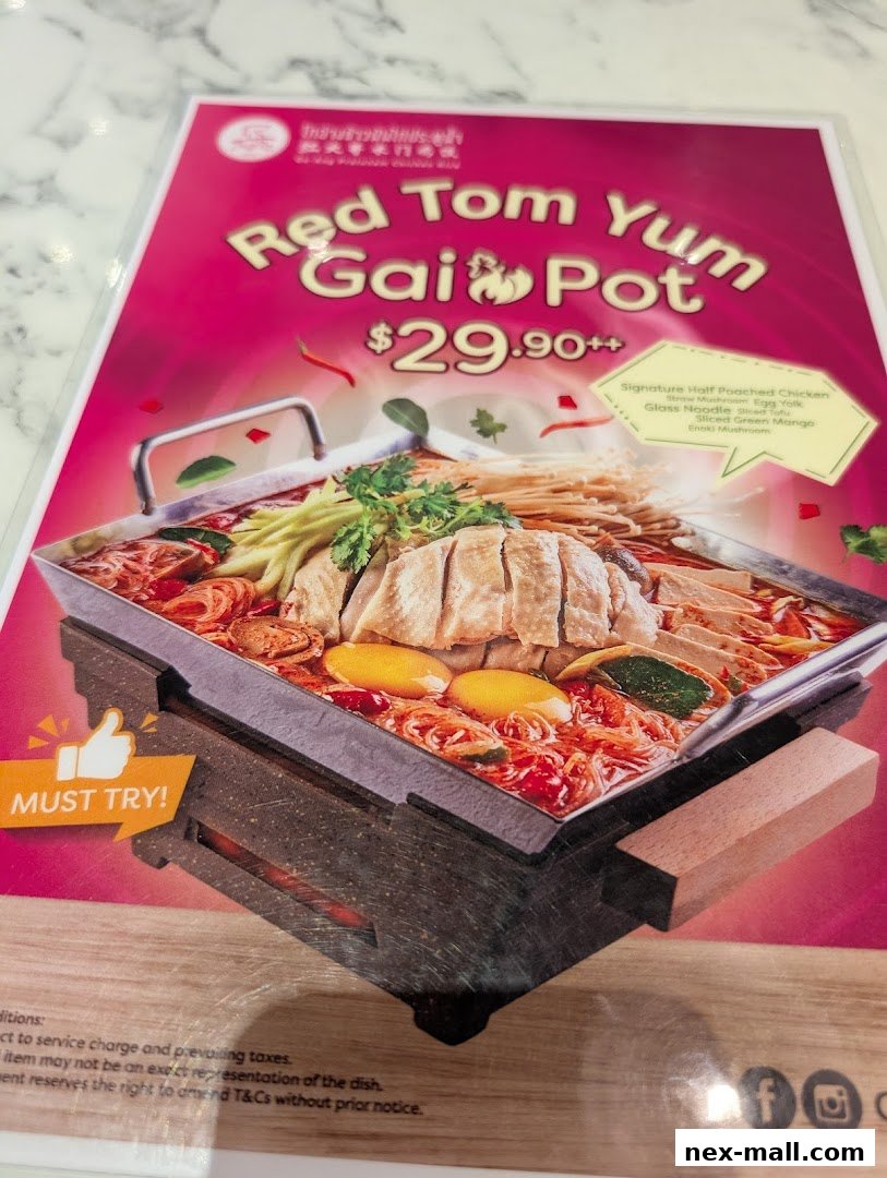 A menu featuring the Red Tom Yum Gai Pot with chicken, eggs, and vegetables.