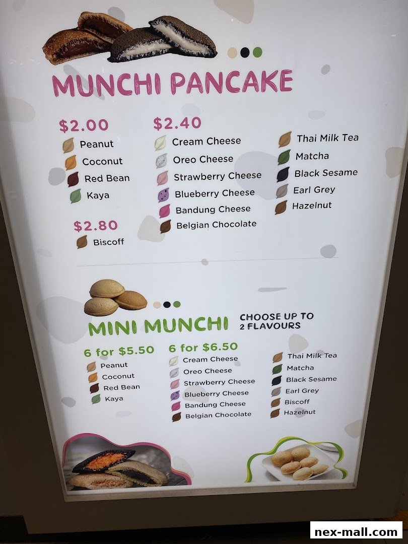 A menu board for Munchi Pancakes, showcasing various pancake flavors and prices.