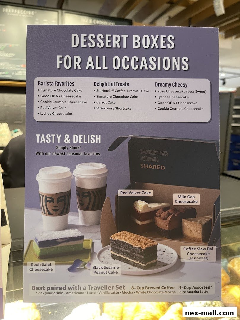 A menu board showcasing Starbucks dessert boxes for all occasions with various cake and cheesecake options.