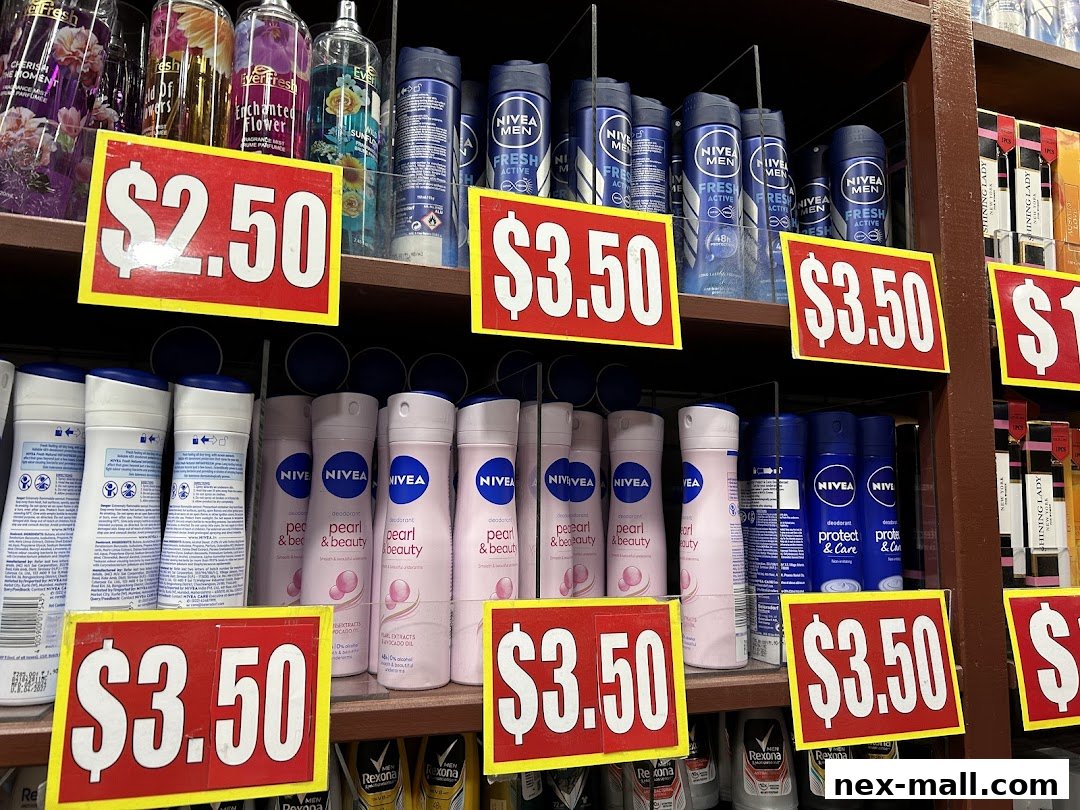 Shelves stocked with various deodorants and body sprays, featuring prominent price tags.