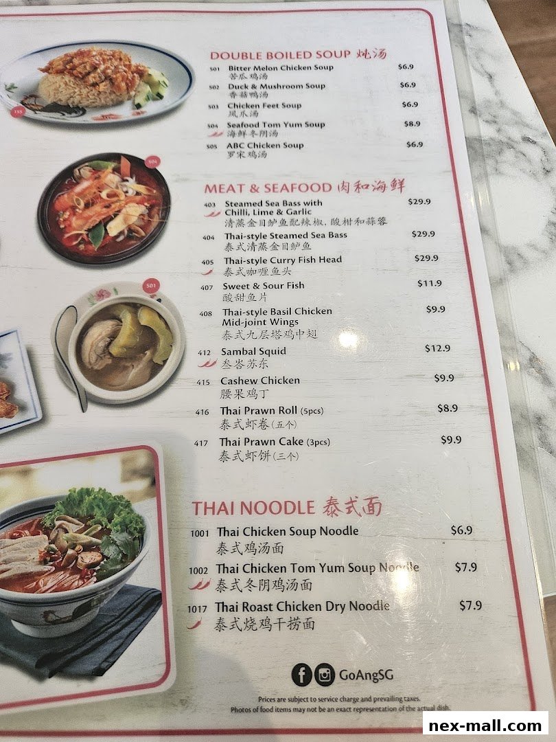 A menu from Go-Ang Pratunam Chicken Rice featuring soups, meat, seafood, and Thai noodles.