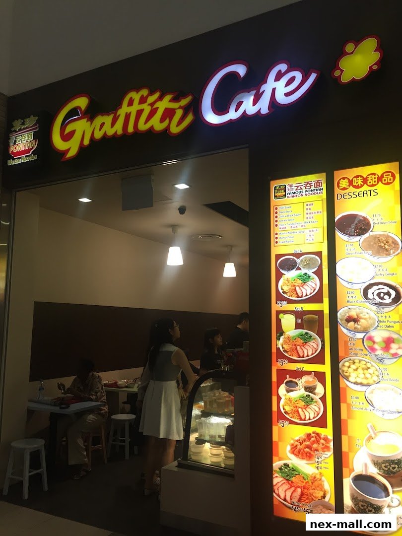 Graffiti Cafe shop front with a menu display featuring wonton noodles and desserts.