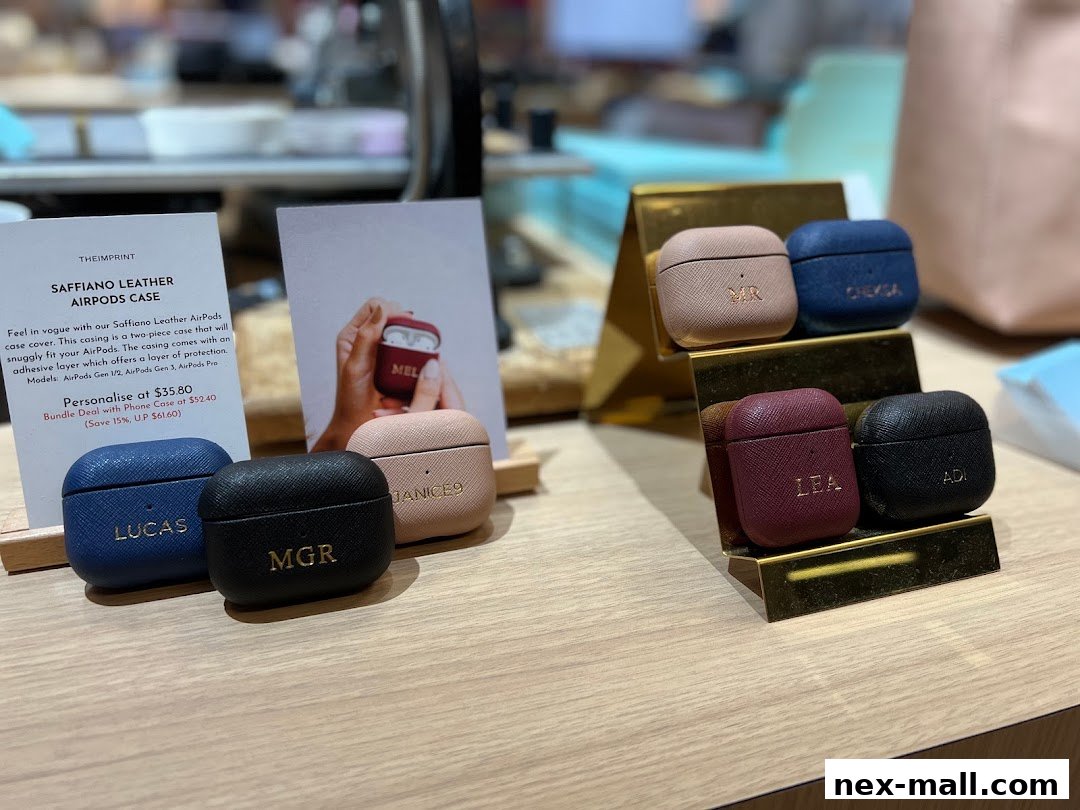 Personalized Saffiano leather AirPods cases in various colors with embossed initials.