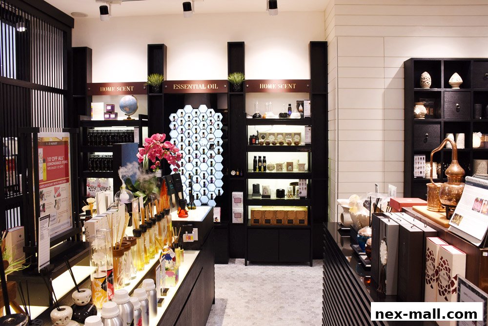 Interior of a shop selling home scents and essential oils, with diffusers and decorative items.