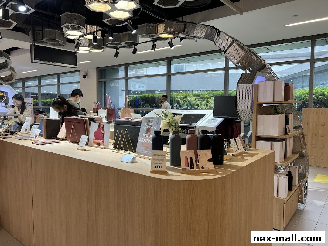 Interior of a modern gift shop with wooden counters displaying personalized items and bottles.