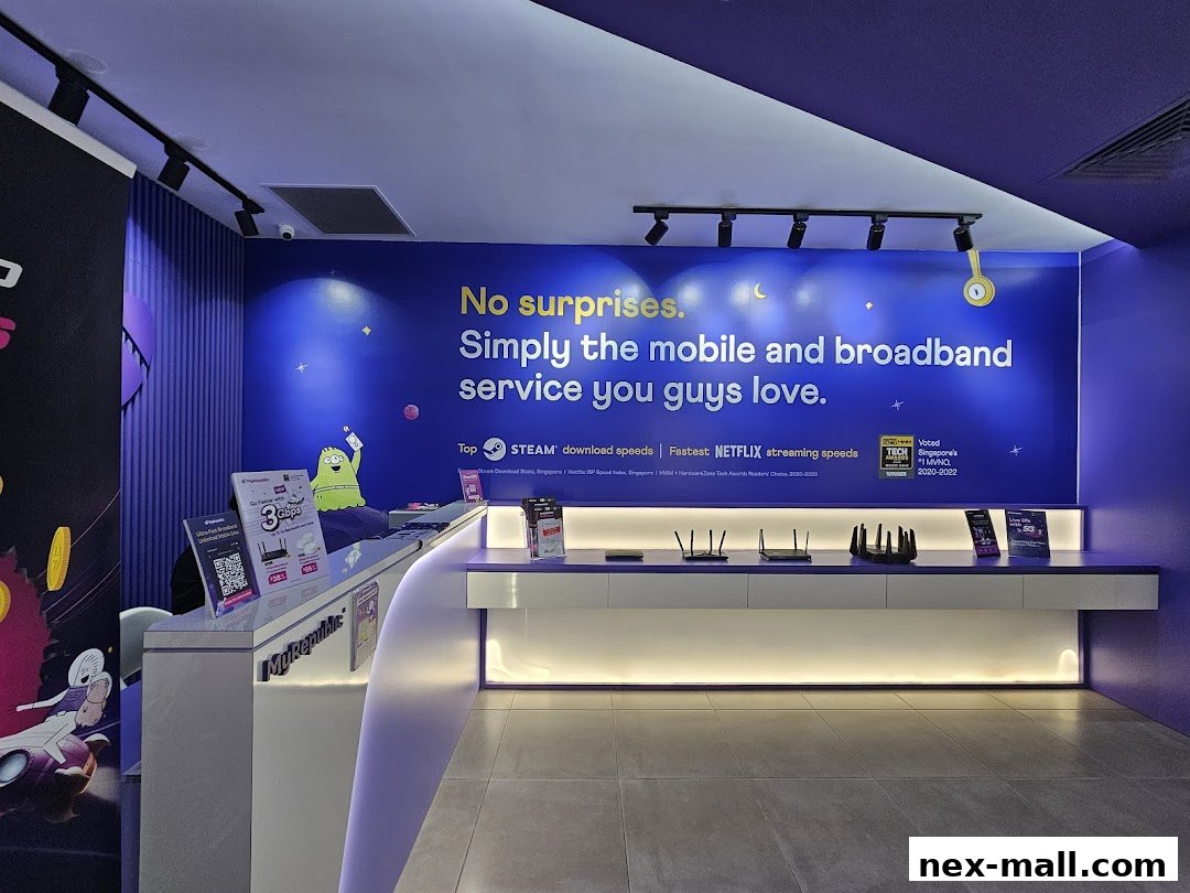 Interior of a brightly lit MyRepublic store with a large blue wall featuring marketing slogans and product displays.