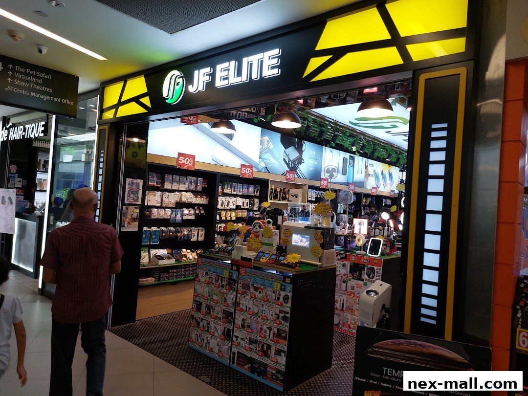 The JF Elite NEX shop front displays a wide variety of electronic accessories and gadgets.