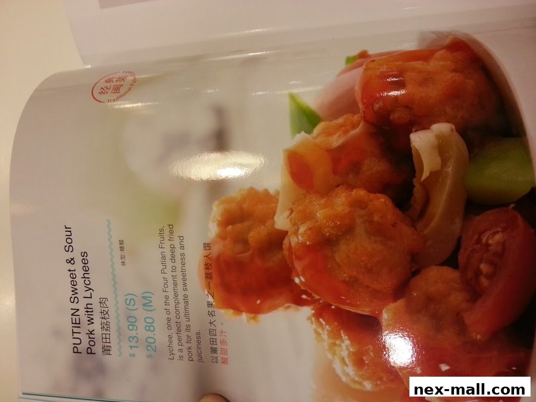 A menu item featuring PUTIEN Sweet & Sour Pork with Lychees, with prices and description.