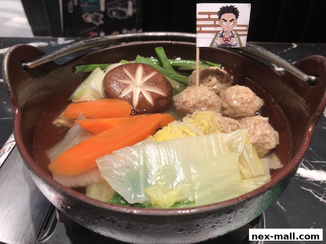 A hot pot dish with meatballs, shiitake mushroom, carrots, and cabbage, topped with a character flag.