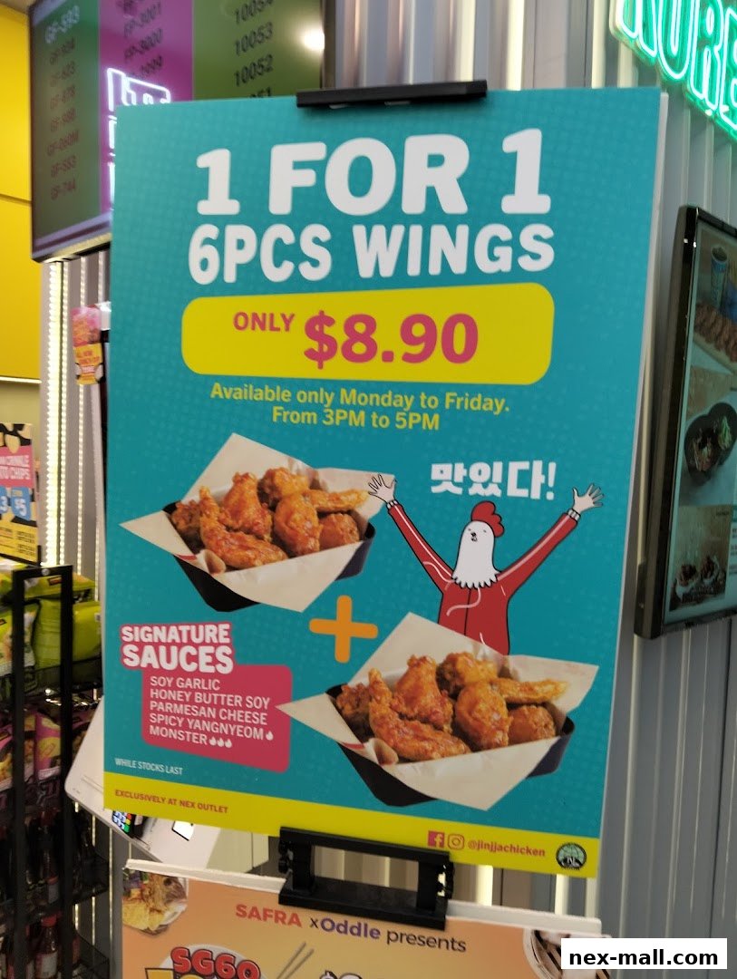 A promotional poster for JINJJA Chicken offering a 1-for-1 deal on 6 pieces of wings.