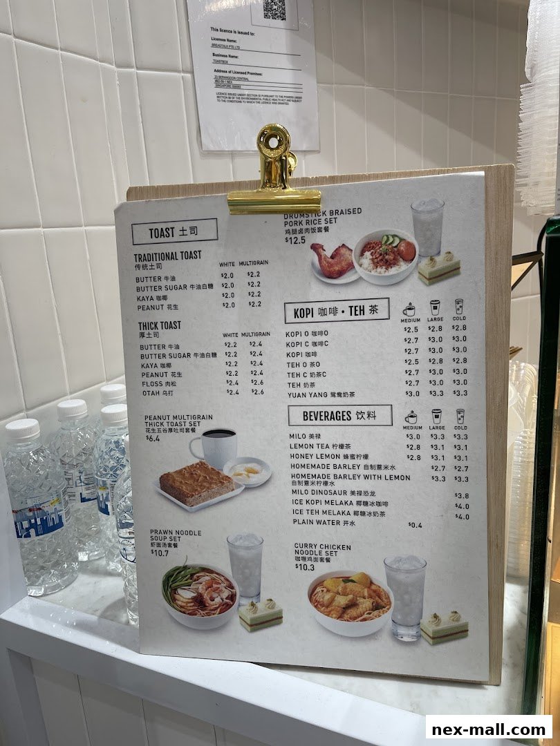 A menu board displaying various toast, noodle, and beverage options with prices.