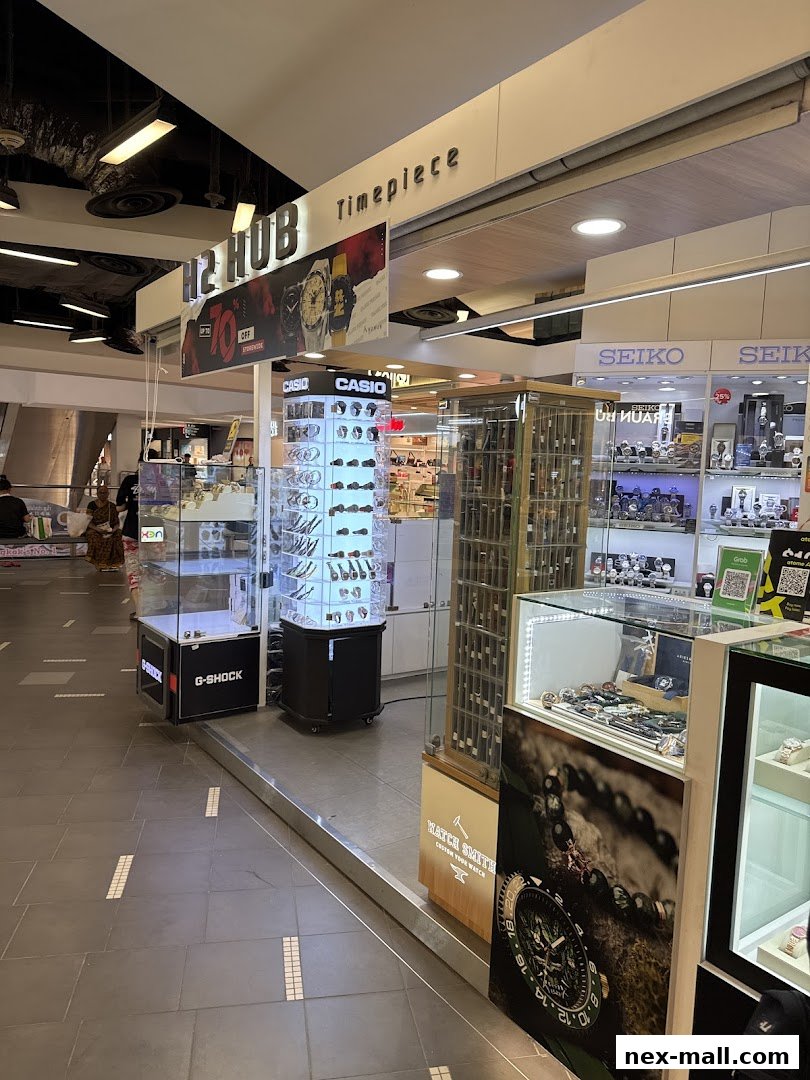 H2 Hub Timepiece shop front displaying various watches and brands like Casio and Seiko.