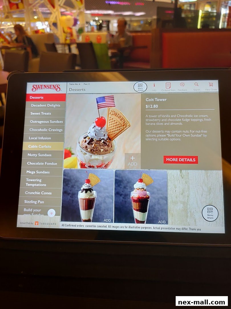 A digital menu displaying Swensen's desserts, featuring the 'Coit Tower' sundae.