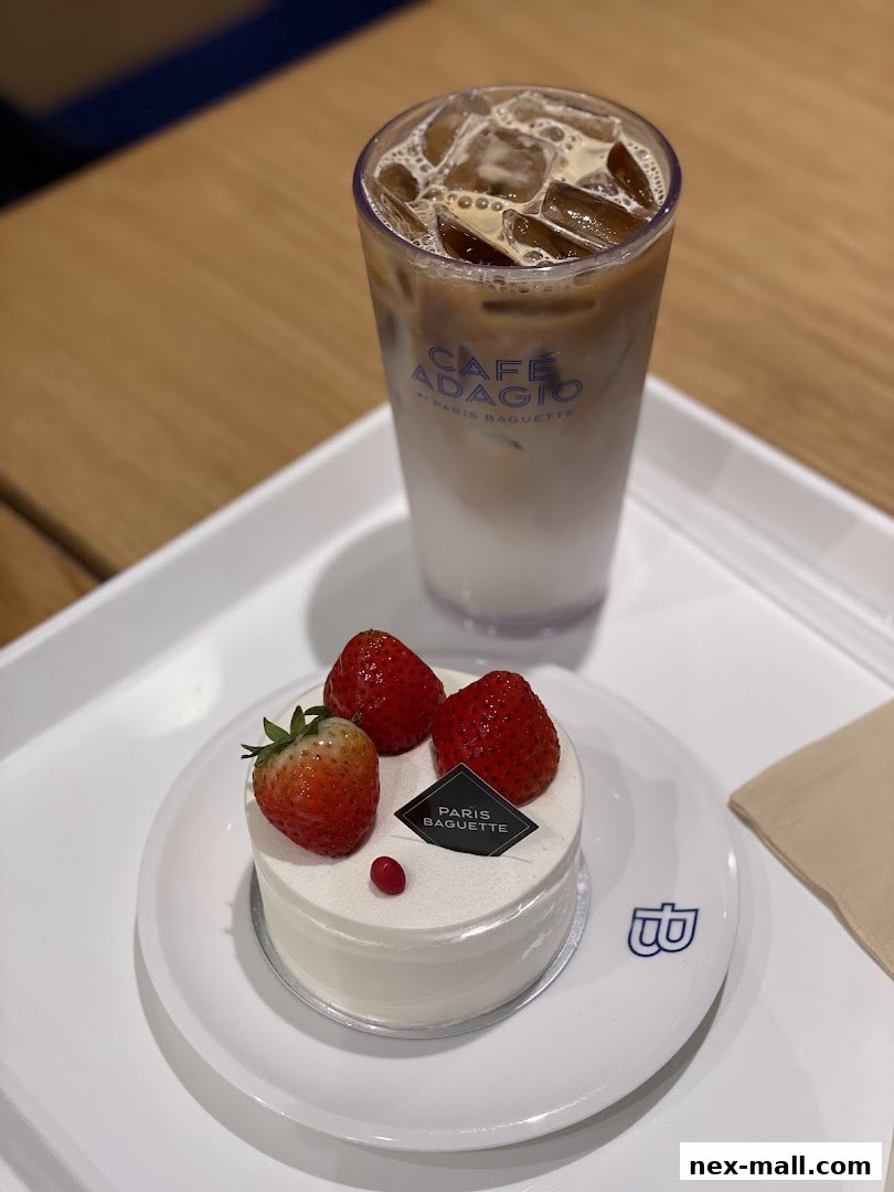 A delicious strawberry cake and an iced coffee from Paris Baguette.
